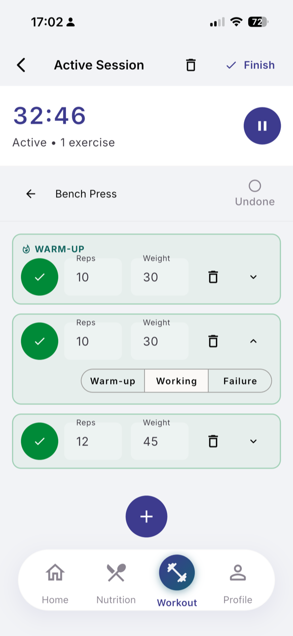 An active session: the timer, Bench Press with a warm-up set and two working sets, each ticked